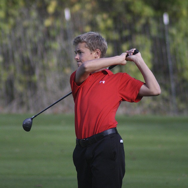 Jimmy Jacobson hits from the fairway on the seventh hole at Mount Si Golf Course. He’s become one of the team’s more dependable players.