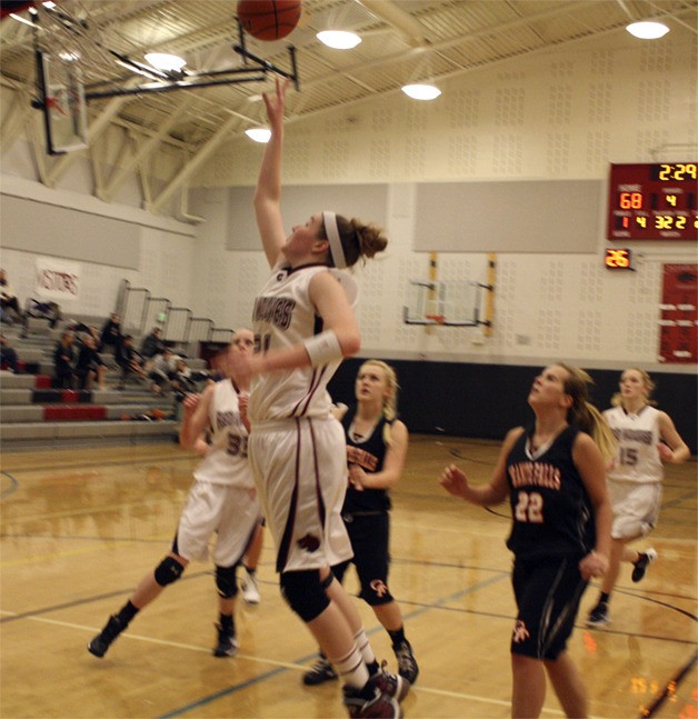 Kailyn Campbell goes up for a basket in the second half of the Jan. 2 game against Granite Falls. She was one of the game's top scorers.