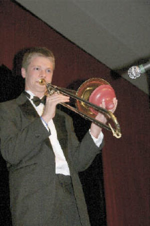 Mount Si High School senior first trombone Drake da Ponte jazzes it up with a mute