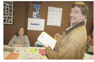 Paul Rasmussen of Snoqualmie gets information at Hopelink Education Coordinator Kathy Nolan’s table