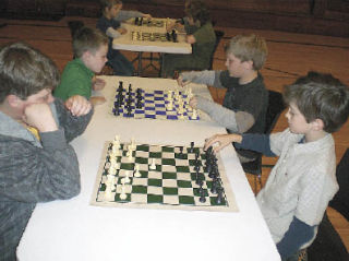 Taking part in a chess tournament held Sunday