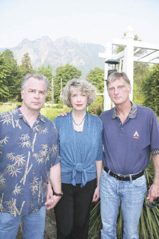Tom and Peggy Bindus and Rob Salopek are among North Bend neighbors who plan to protest the construction of a 150-foot cell tower near their Circle River Ranch homes. They plan to gather with friends and family and be visible when T-Mobile holds its company picnic in North Bend this week.