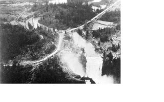 High waters flood the Valley and swell Snoqualmie Falls in the late 1930s or early 1940s
