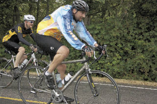 Two serious riders power through the final stretch of the Snoqualmie Valley Hospital Tour de Peaks run. The 20th annual ride