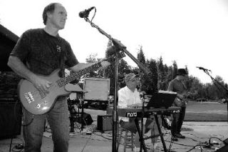 Members of The Brakes jam at Centennial Fields during the first Snoqualmie summer concert installment