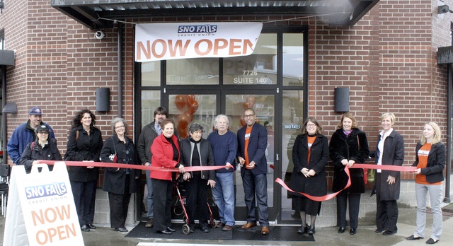 David Hamilton/Staff PhotoMembers and staff of Sno Falls Credit Union celebrated the grand opening of a new branch on Snoqualmie Ridge