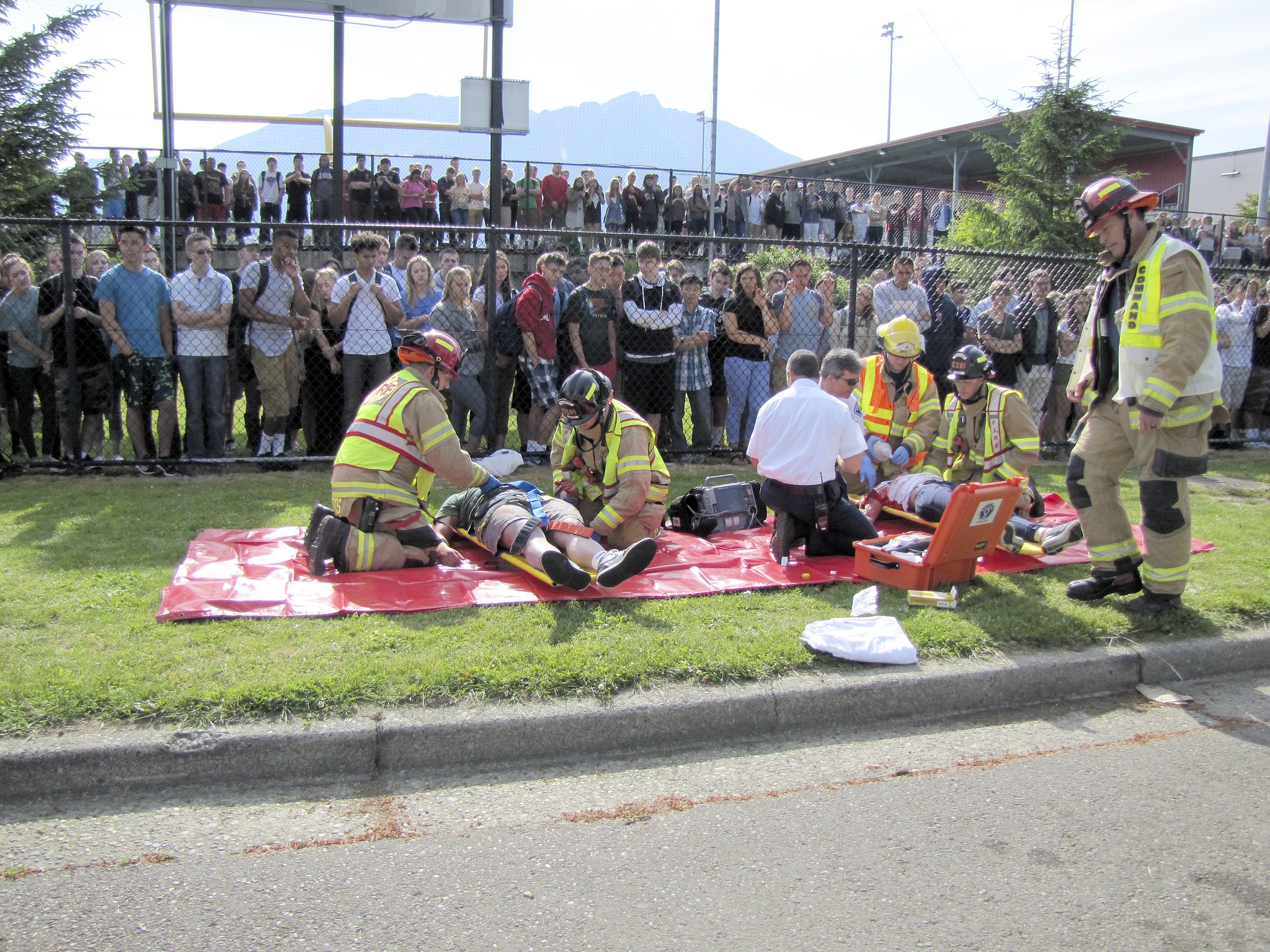 Photos courtesy of Marla Gall The Snoqualmie Fire and Police departments demonstrated how they handle a car crash in front of a live audience of Mount Si High School students for a mock crash exercise during the school’s Think and Drive week to deter drinking and driving.