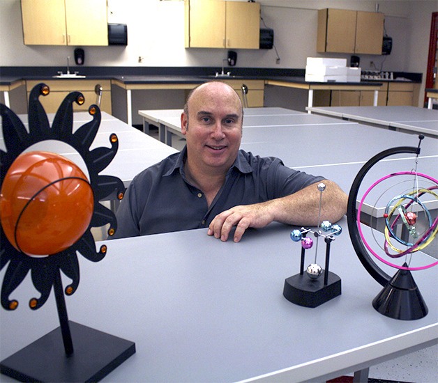 Science teacher Kevin Knowles starts settling into his new classroom