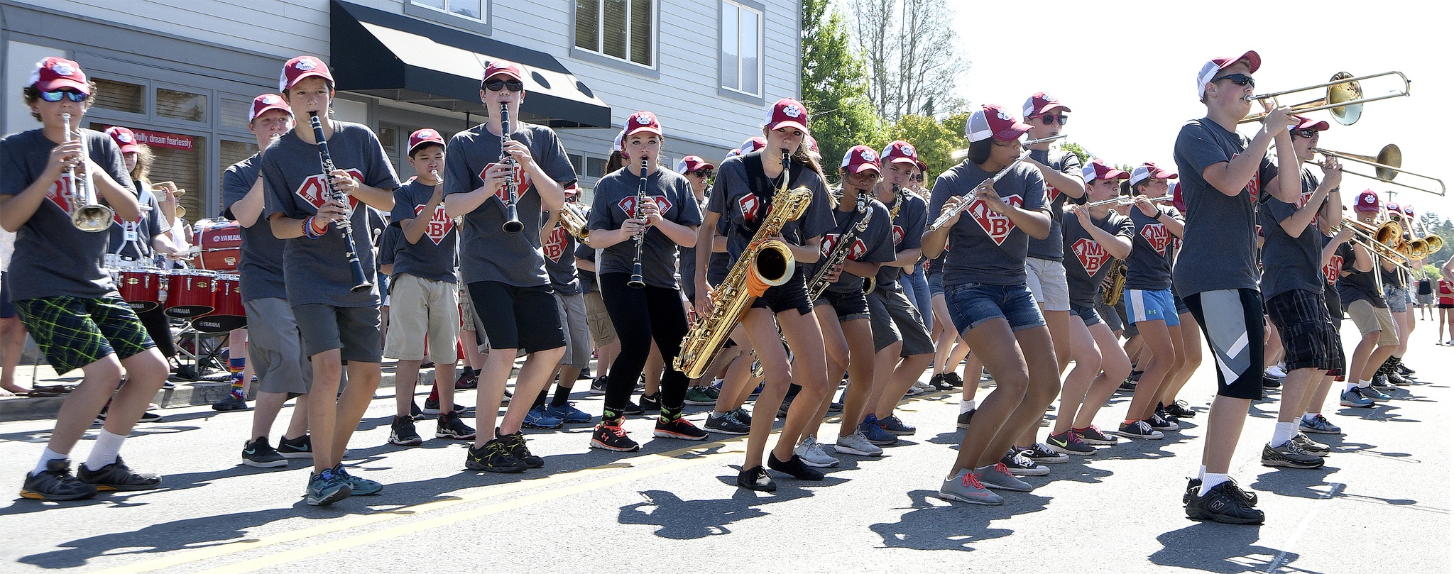 Members of the Snoqualmie Valley Youth Marching Band perform “Bang Bang” for the judges at the Railroad Days Grand Parade Saturday morning.