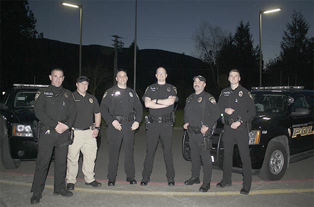 The inaugural members of Snoqualmie Police Department’s dedicated North Bend patrol hit the street following a March 12 meet and greet at North Bend Elementary. One of these Snoqualmie officers is in North Bend at all times. From left are Dmitri Vlados