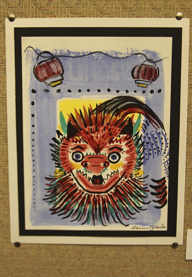 A dragon by Snoqualmie artist Lanice Gillard looks fierce on the wall at North Bend Library