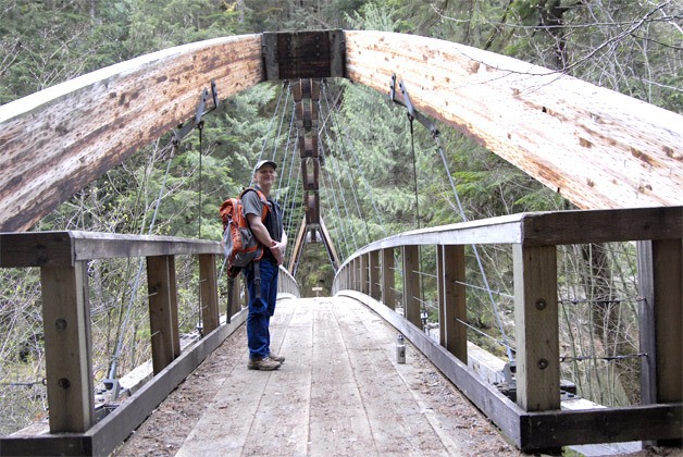 Hiking the airlifted footbridge over the Middle Fork of the Snoqualmie River