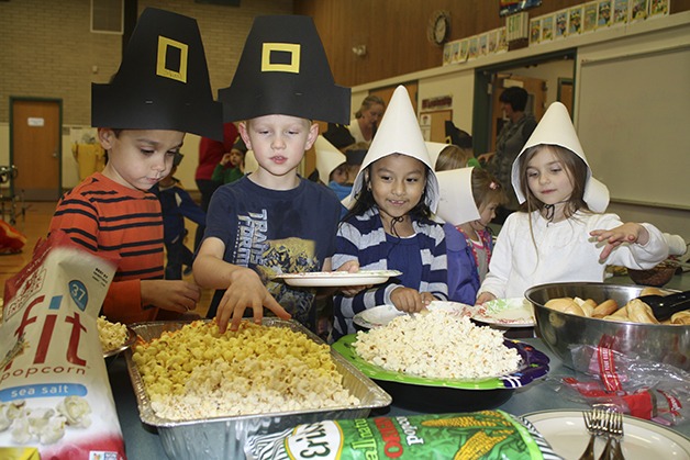 North Bend Kindergartners go for the popcorn during their Nov. 21 feast