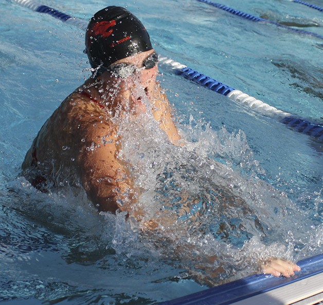 Mount Si's Jessica Brady bursts from the water during the IM breaststroke competition Sept. 26.