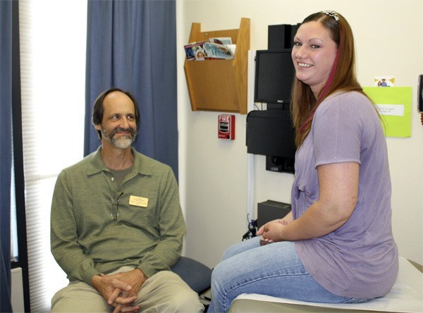 Raechel Femling meets with Dr. Alan Johnson at Snoqualmie Ridge Medical Clinic. Femling