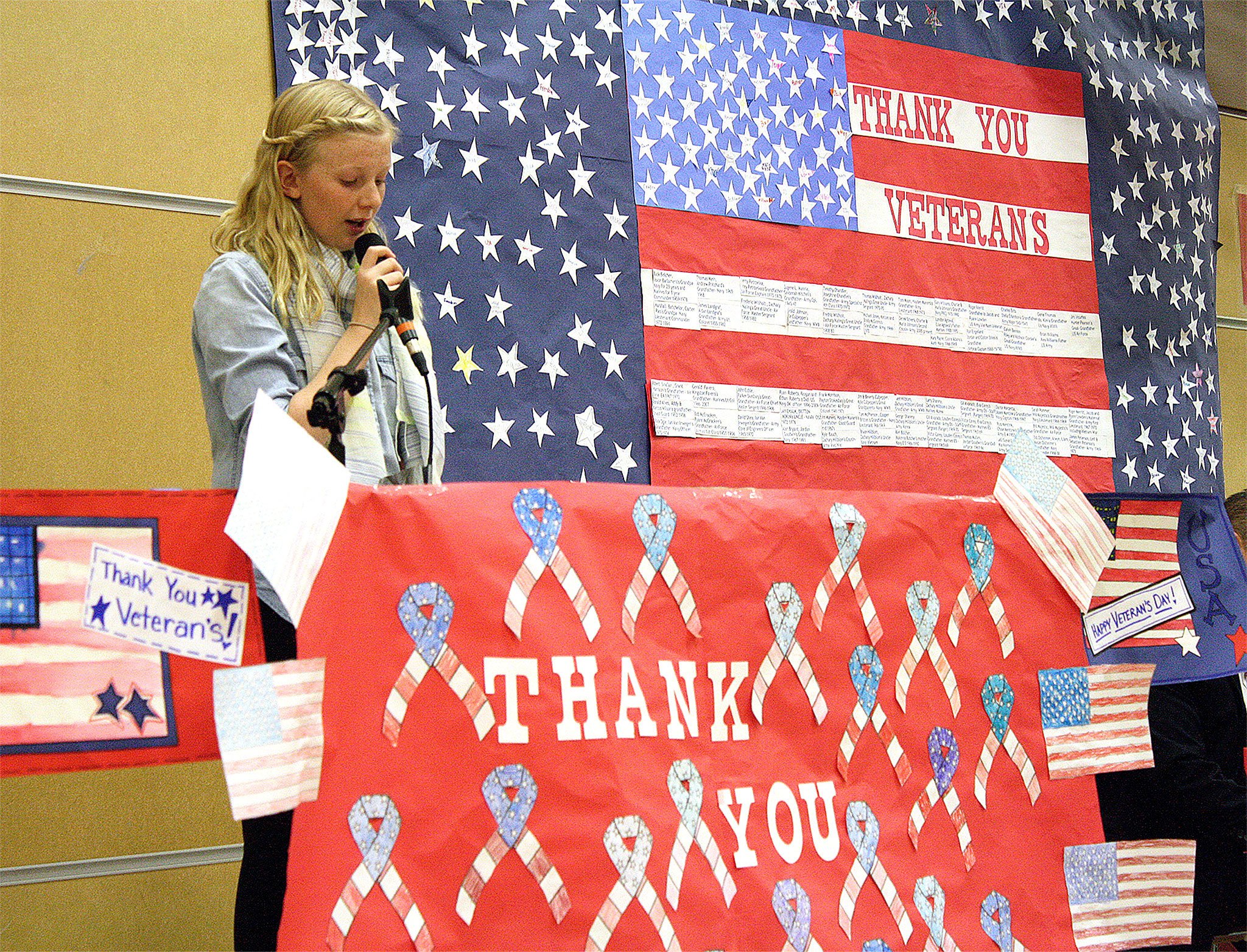 Evan Pappas/File Photo                                 Lauren Kremer spoke during the 2015 Snoqualmie Elementary School Veterans Day assembly.
