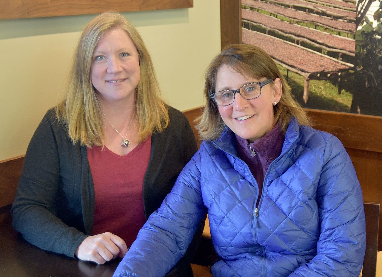 Heidi Dukich and Lauren Clark are members of the 100 Women Who Care - Greater Snoqualmie Valley group that formed in the area last May.                                Carol Ladwig/Staff Photo