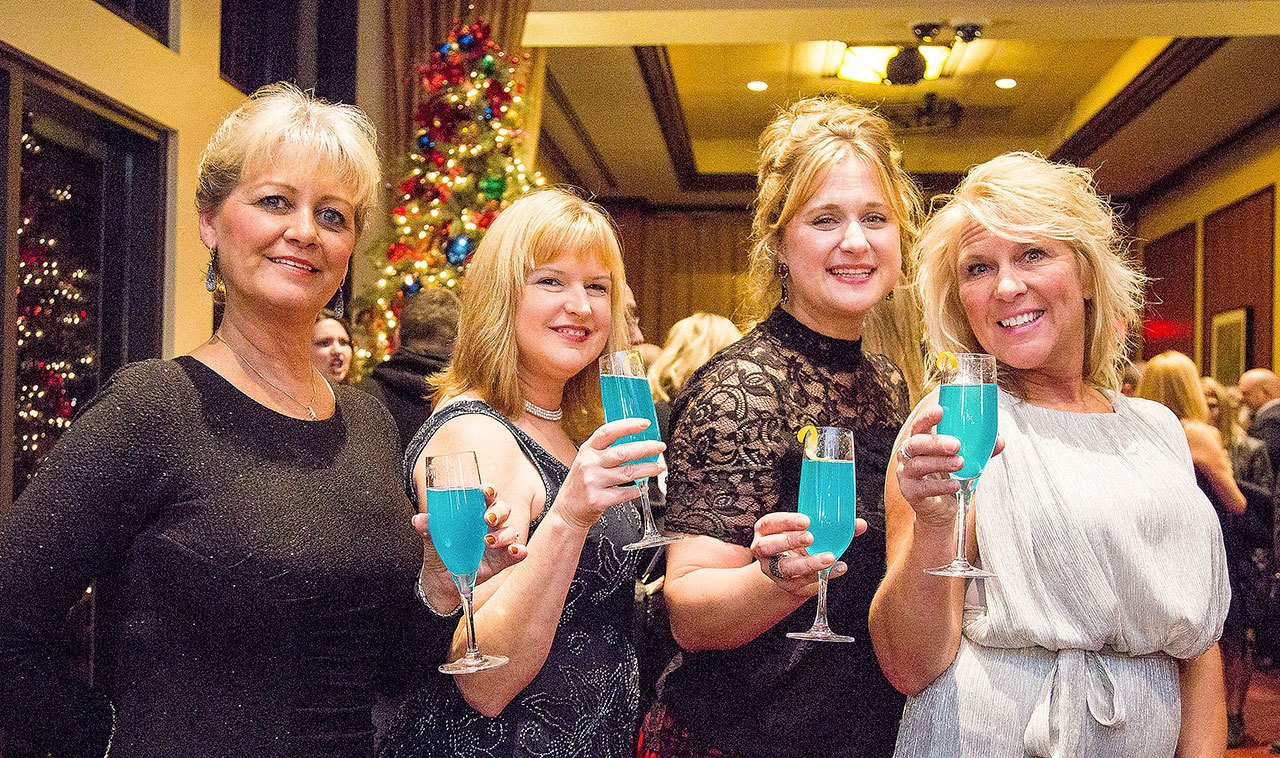 Ladies toast with special blue champagne, sponsored by the Snoqualmie Casino, at the Nov. 18 Chamber gala.                                Courtesy Photo