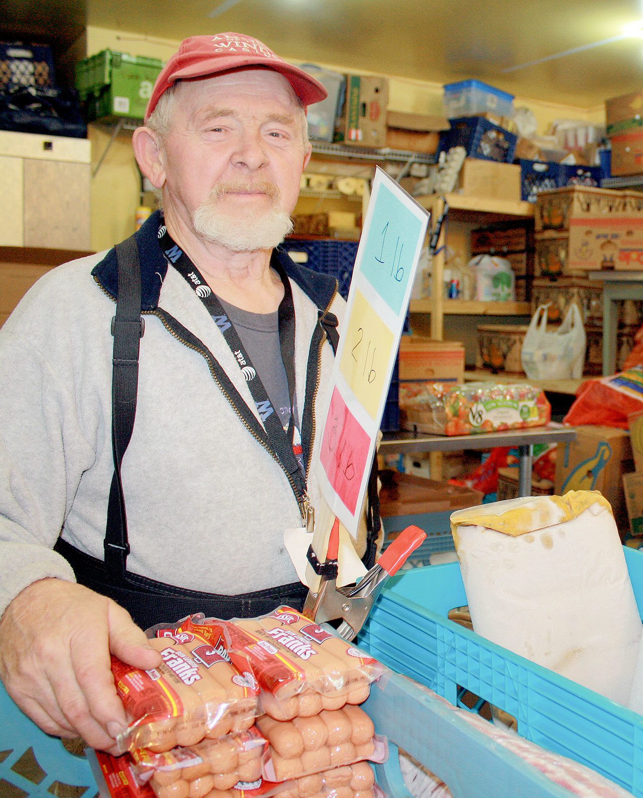 Art Hobbs helps out at the Snoqualmie Valley Food Bank in 2012.                                File Photo