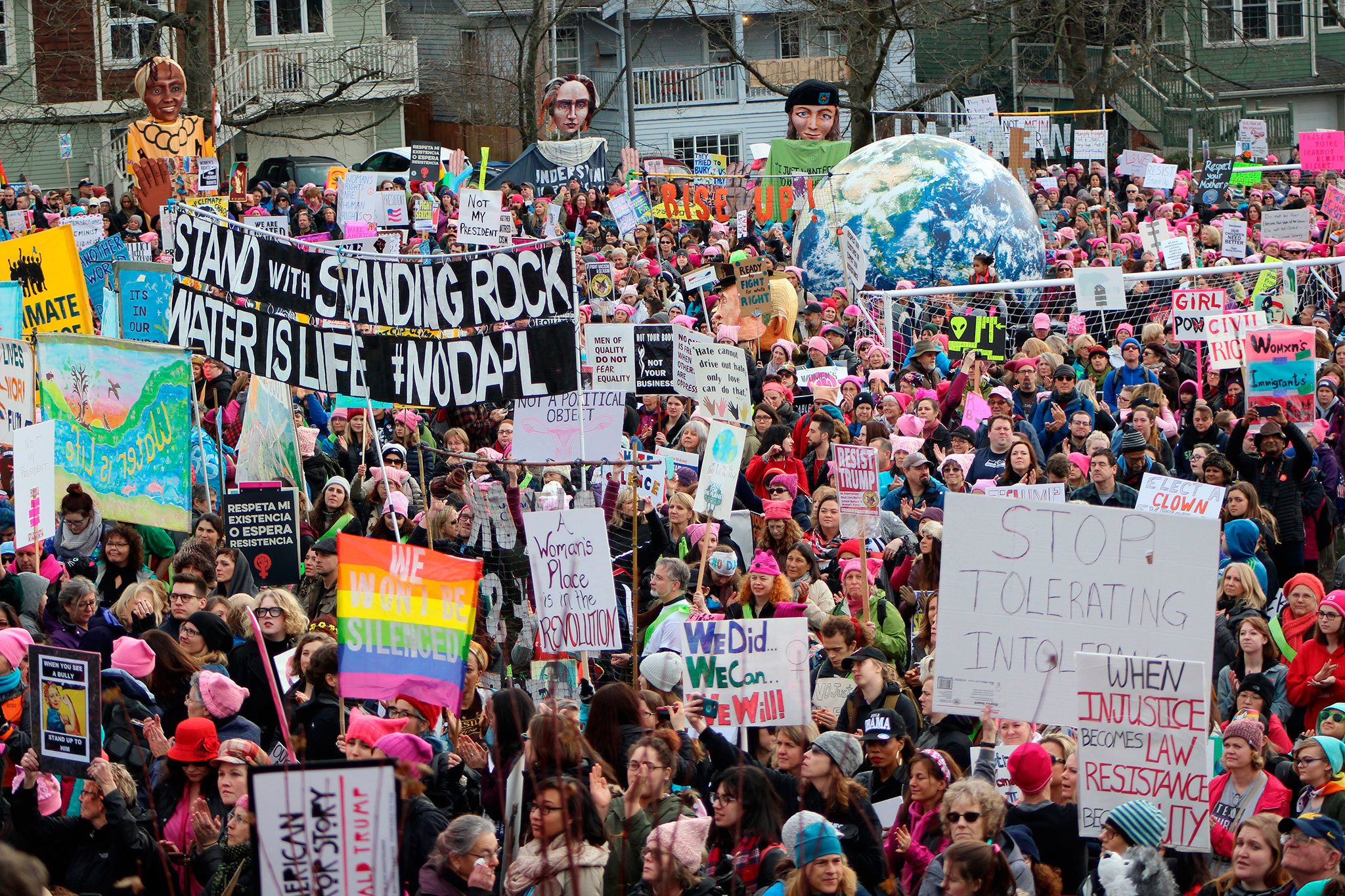 Marchers gather in Judkins Park to listen to speeches before marching to Seattle Center Saturday in the Women&rsquo;s March on Seattle.                                Allison DeAngelis/Staff Photo