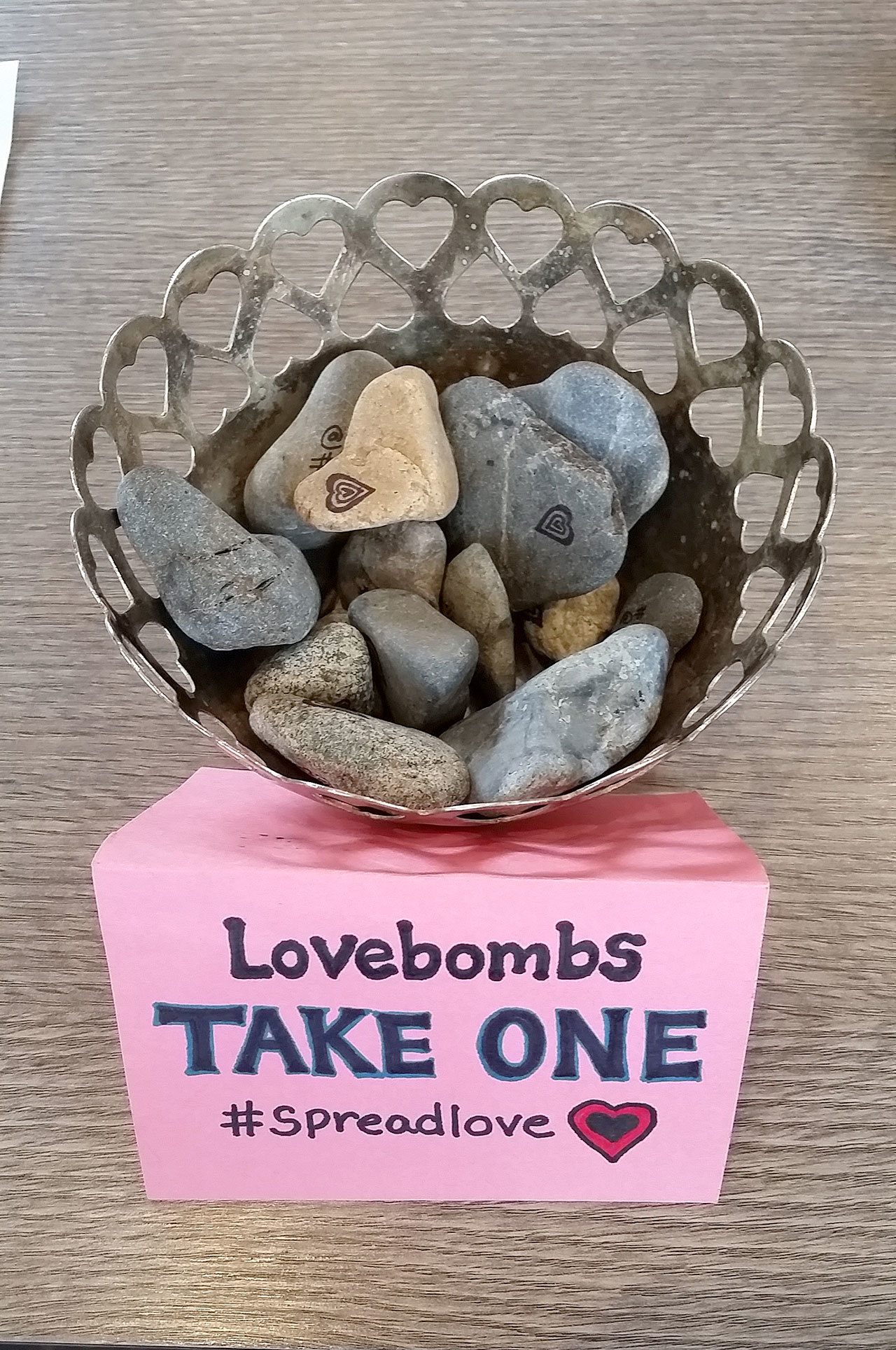 A basket full of Rowan’s heart-shaped rocks for anyone to take and share. (Courtesy Photo)