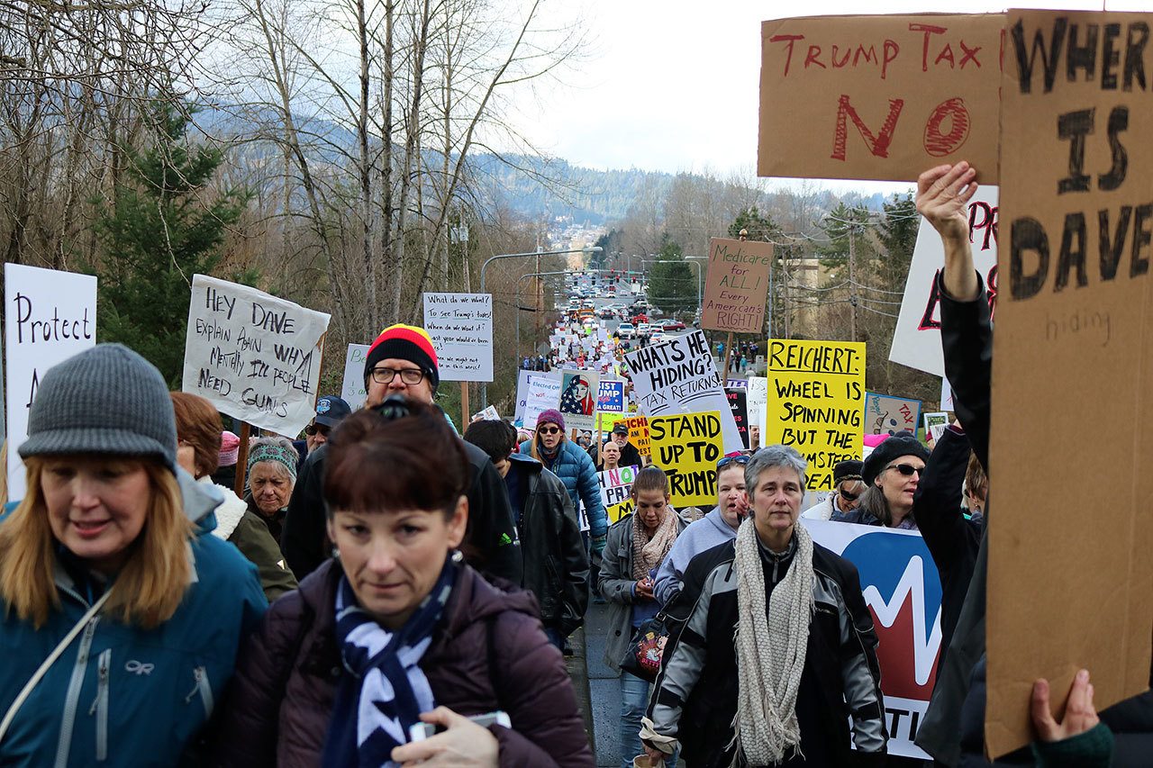 About 1,000 people marched to Congressman Dave Reichert&rsquo;s office on Southeast 56th Street. Nicole Jennings/staff photo