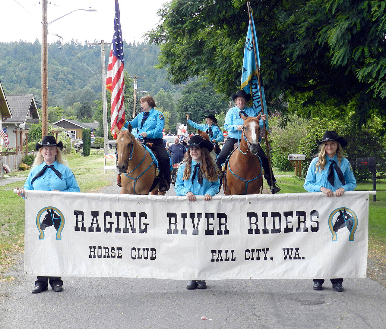 The Raging River Riders Horse Club, here lining up for a Fourth of July parade, will have a booth at the Community Info Day Saturday at Fall City Library.                                Williams Shaw/File Photo