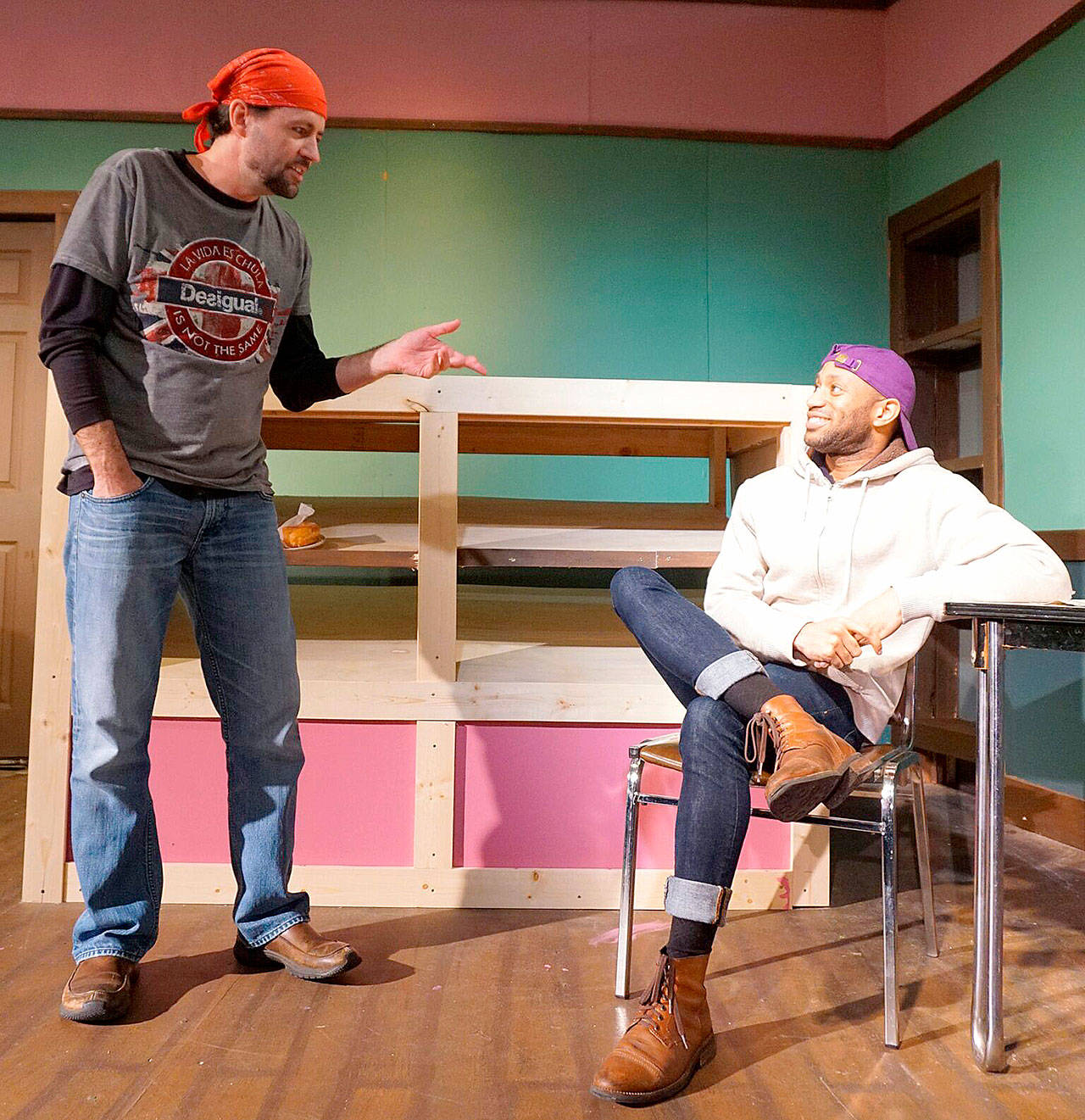 Brenden Ellwood and Lamar Legend perform a scene from Valley Center Stage’s production of “Superior Donuts,” opening Friday, Mardch 24 at the North Bend community theater.                                Photo courtesy of René Schuchter