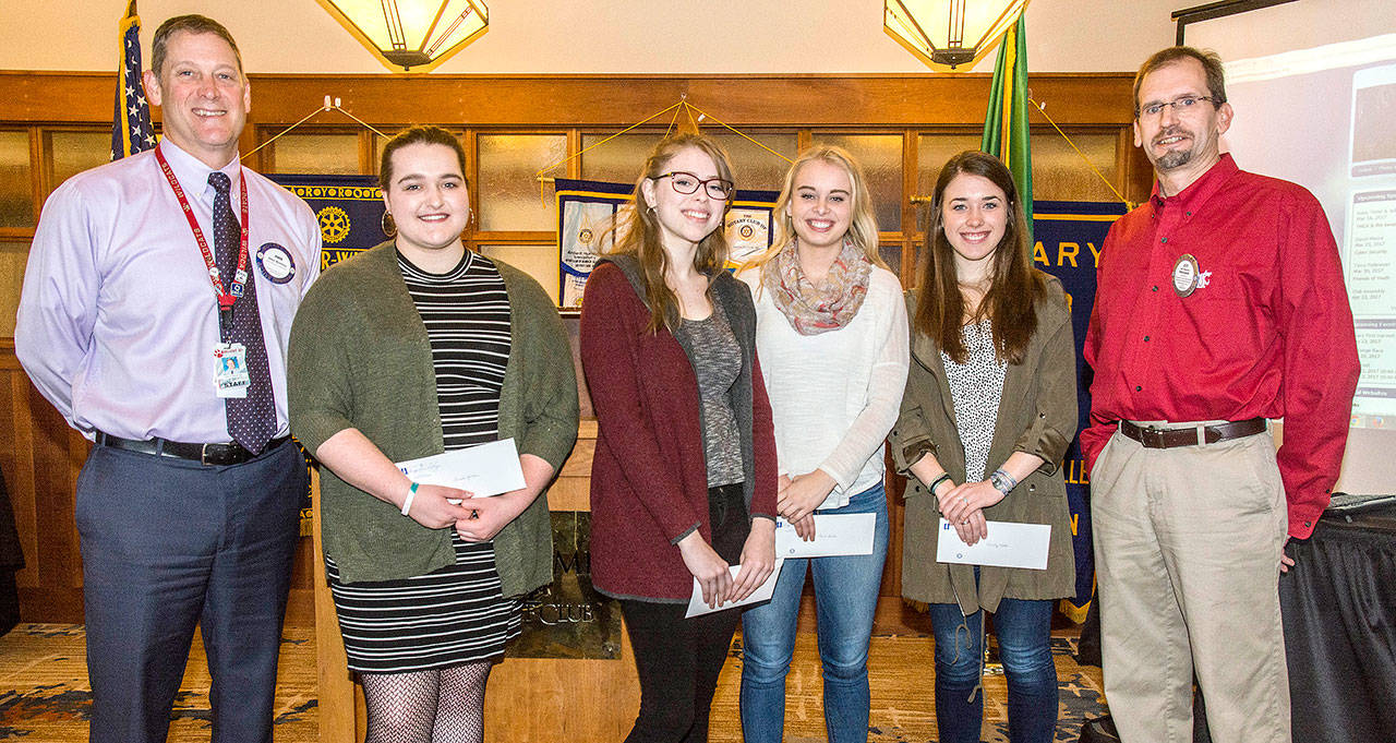 Rotary of Snoqualmie Valley recently recognized four Mount Si High School students as students of the month. Pictured from left are Mount Si Principal John Belcher, students of the month Sara Green, Emily Creed, Kara Link and Emily Webb and Rotary President Jeff Mumma.                                Courtesy photo
