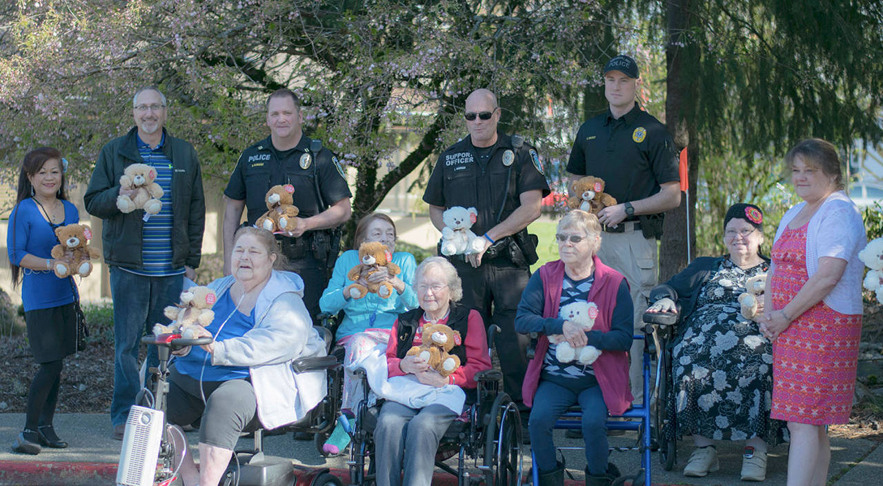 North Bend Regency Care residents donate teddy bears to local law enforcement