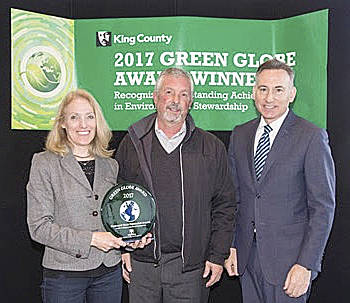 SVPA Executive Director Cynthia Krass, SVPA Board Chair Jim Haack, and King County Executive Dow Constantine accept Green Globe Award to kick off Earth Week. (Courtesy Photo)