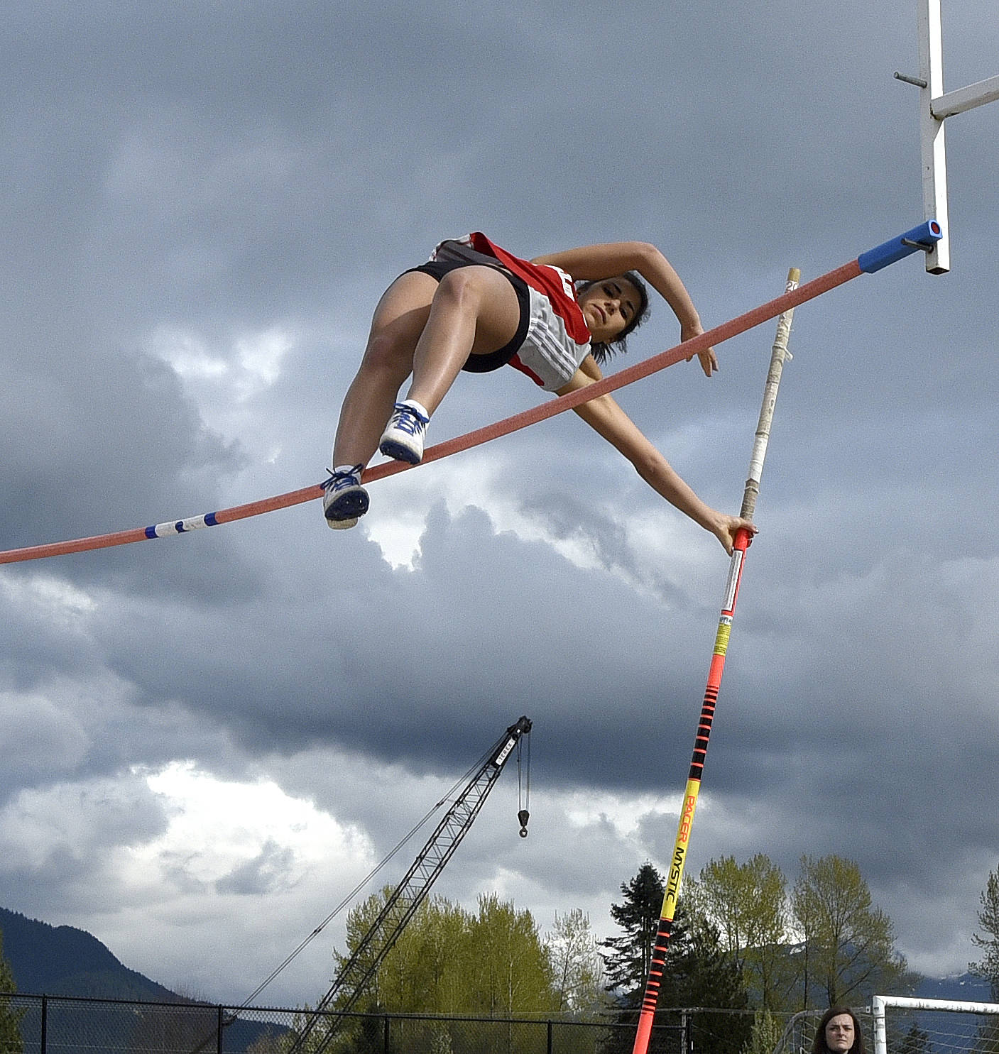 Sarah Panciroli clears another bar in the pole vault. She jumped an even 10 feet to take second in the Eastlake meet.                                Carol Ladwig/Staff Photo