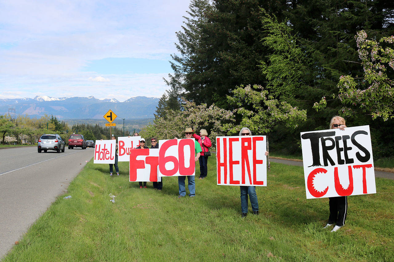 A group of Valley residents protest the Snoqualmie Ridge hotel project. (Evan Pappas/Staff Photo)