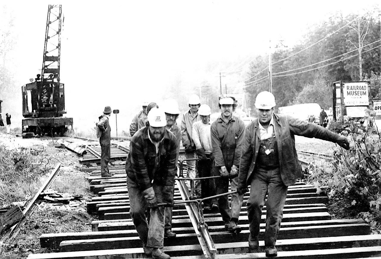 In this historic photo from the Northwest Railway Museum, volunteers work on construction of tracks for the Snoqualmie Valley Railroad, shuttling visitors from North Bend and Snoqualmie to the Falls and back for 50 years now.                                Courtesy Photo