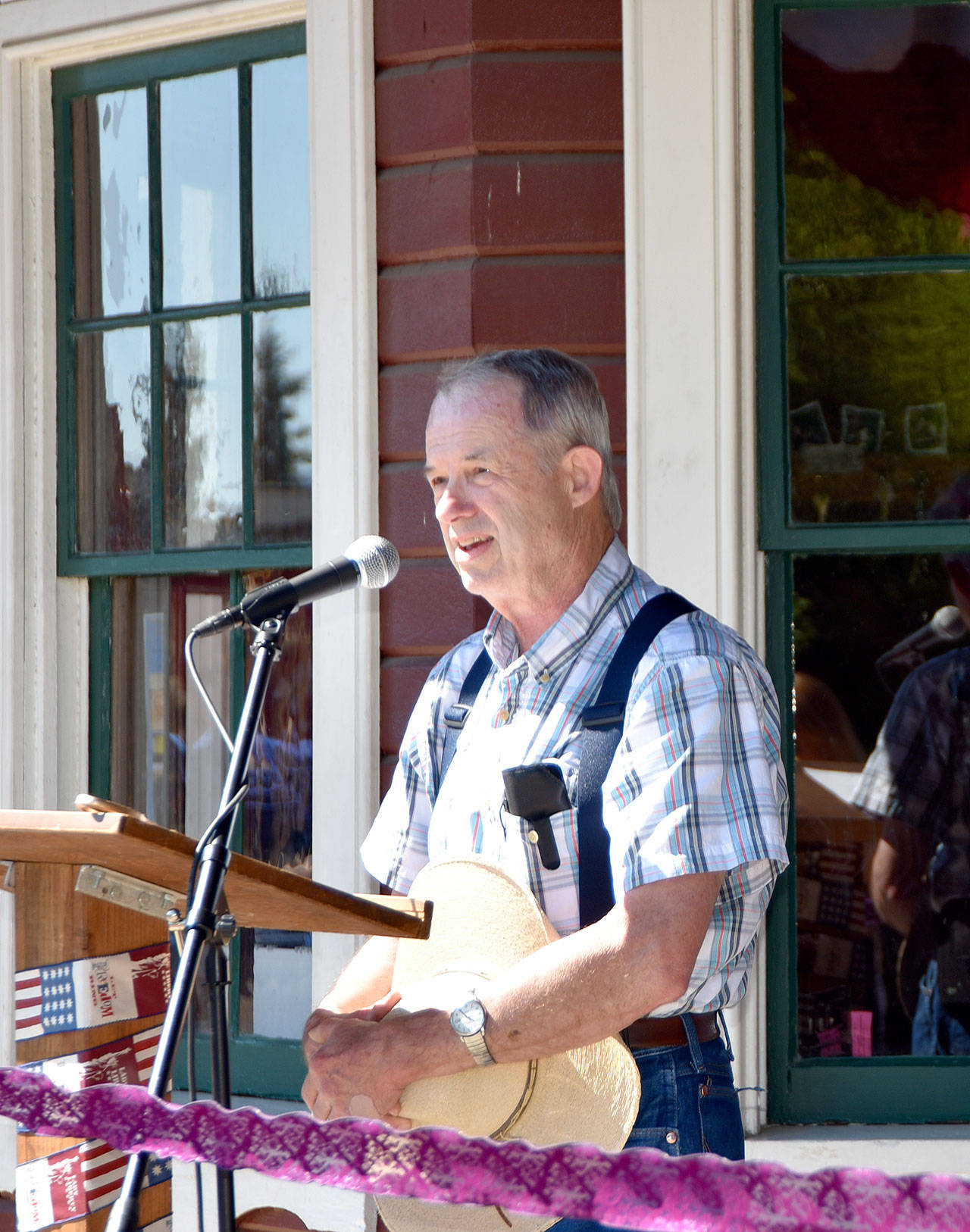 Bill Petitjean, who served as a fire man on the very first passenger train trip the museum provided 50 years ago, recalled the day at a celebration of the anniversary Sunday at the historic Snoqualmie Depot.                                Carol Ladwig/Staff Photo