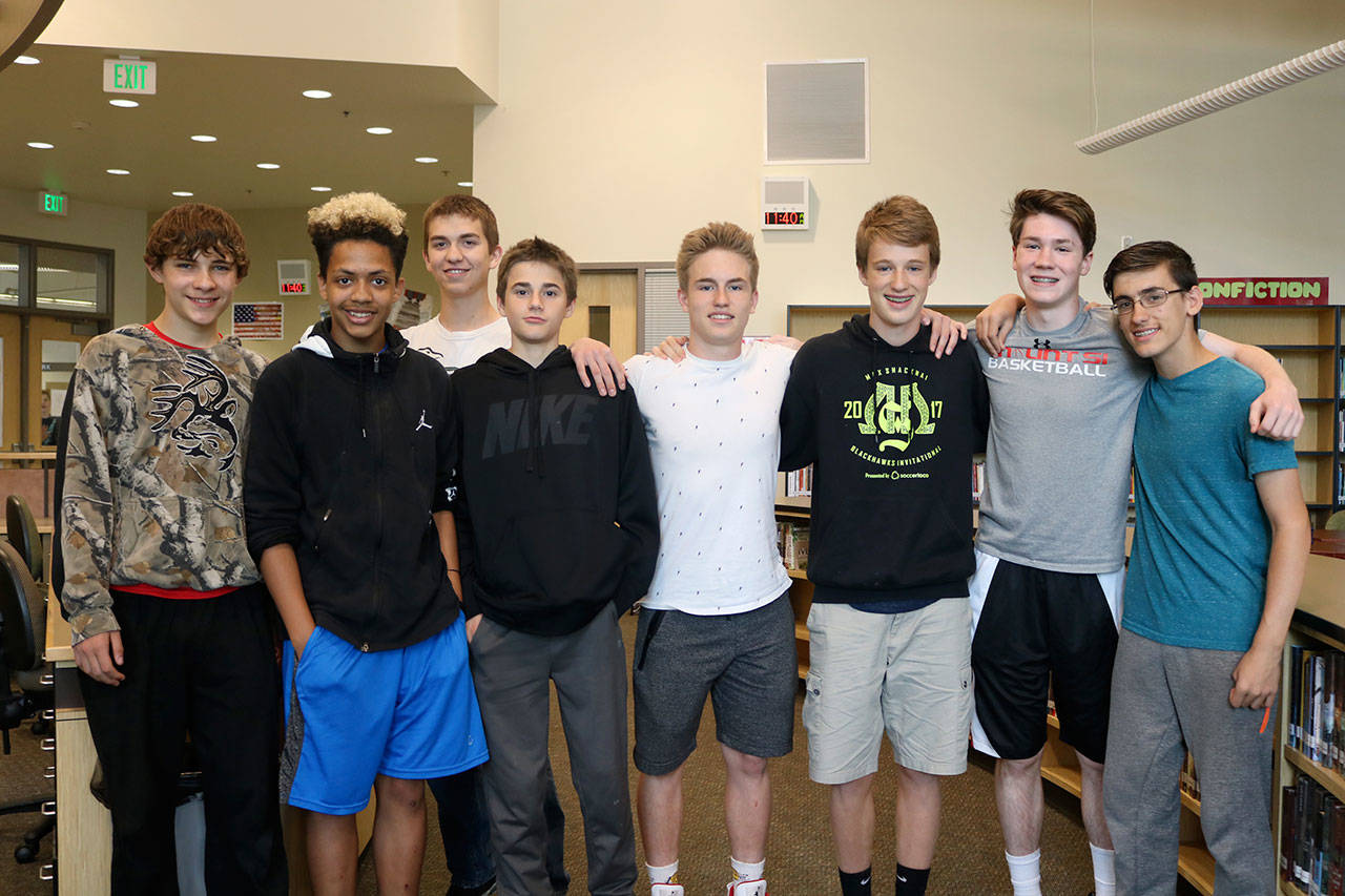 Eight students stuck with track from sixth to eighth grade and led the team through a three-year undefeated streak. From left: Jack Allen, Lorenzo Beverly, Nicholas Ayling, Tanner Daniels, Landon Reynolds, Noah Ribary, Zach Hall and Aidan Medina.                                (Evan Pappas/Staff Photo)