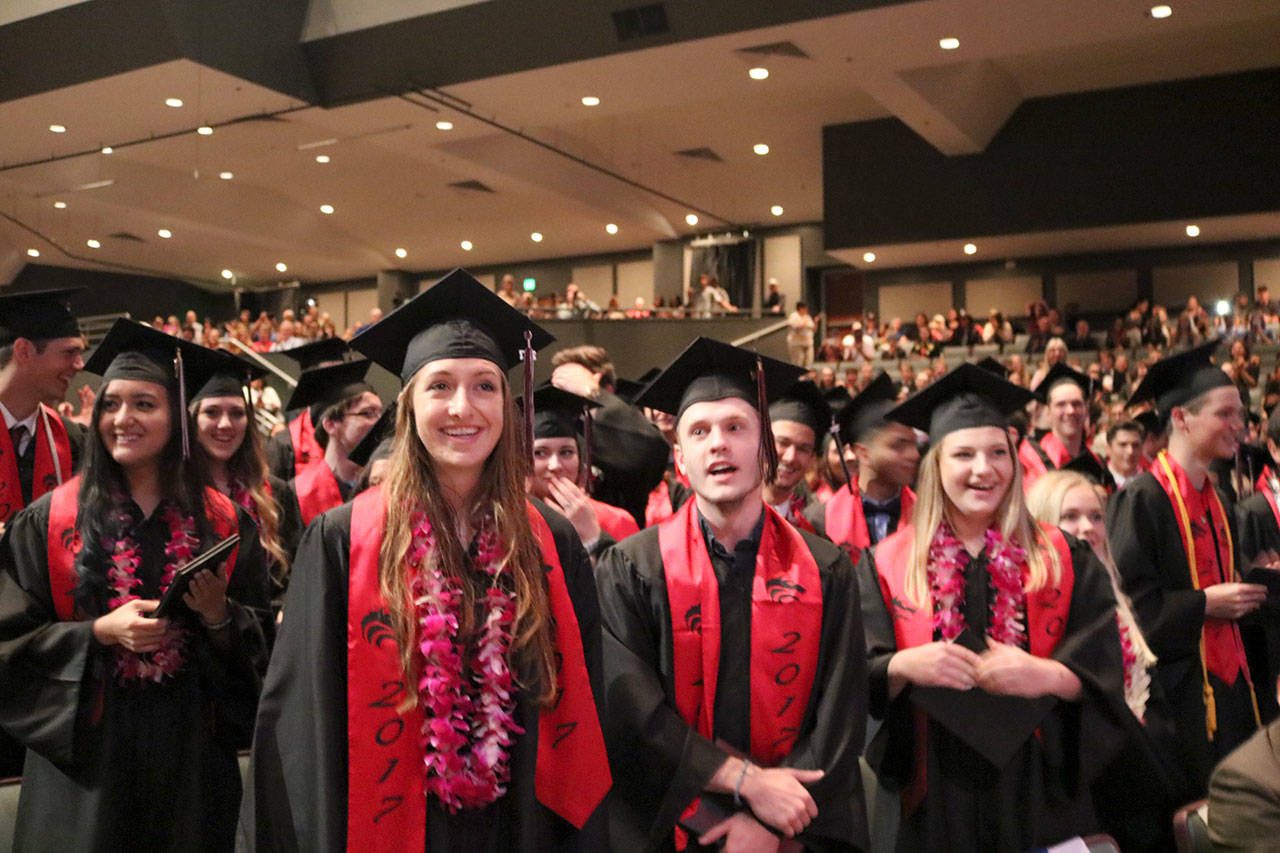 Graduates are filled with excitement as the Overlake Church auditorium filled up with their friends and family Friday, June 16.                                (Evan Pappas/Staff Photo)