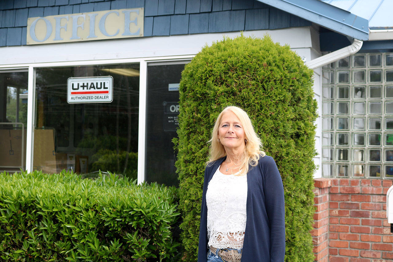 Cindy Everson, outside of the main office at Ole Cedar Mill Mini Storage. The office building was also used during the properties years as a Cedar Mill. (Evan Pappas/Staff Photo)