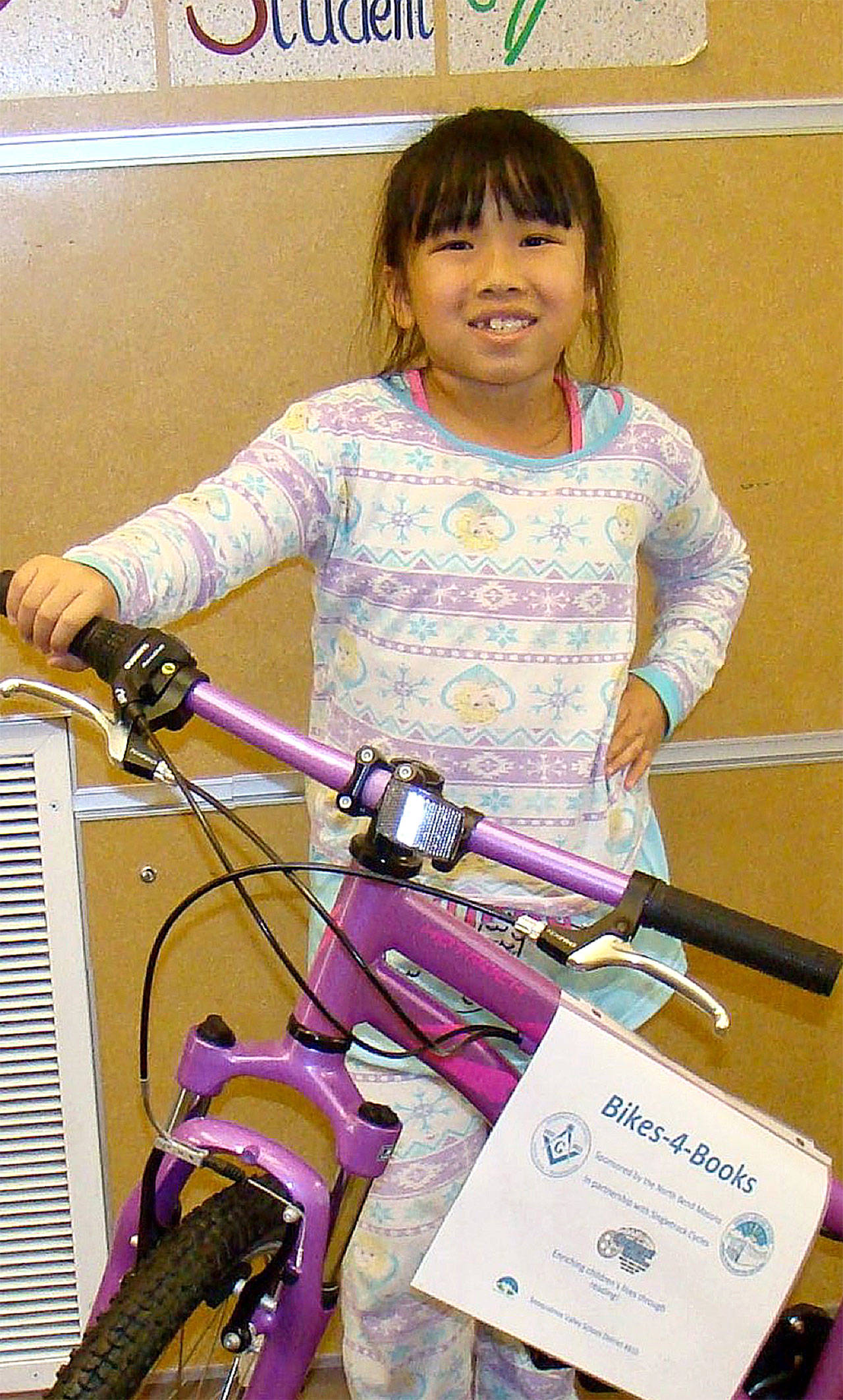 Cascade View second grader Destiny Chang is a Bikes for Books 2017 winner.                                Courtesy Photo