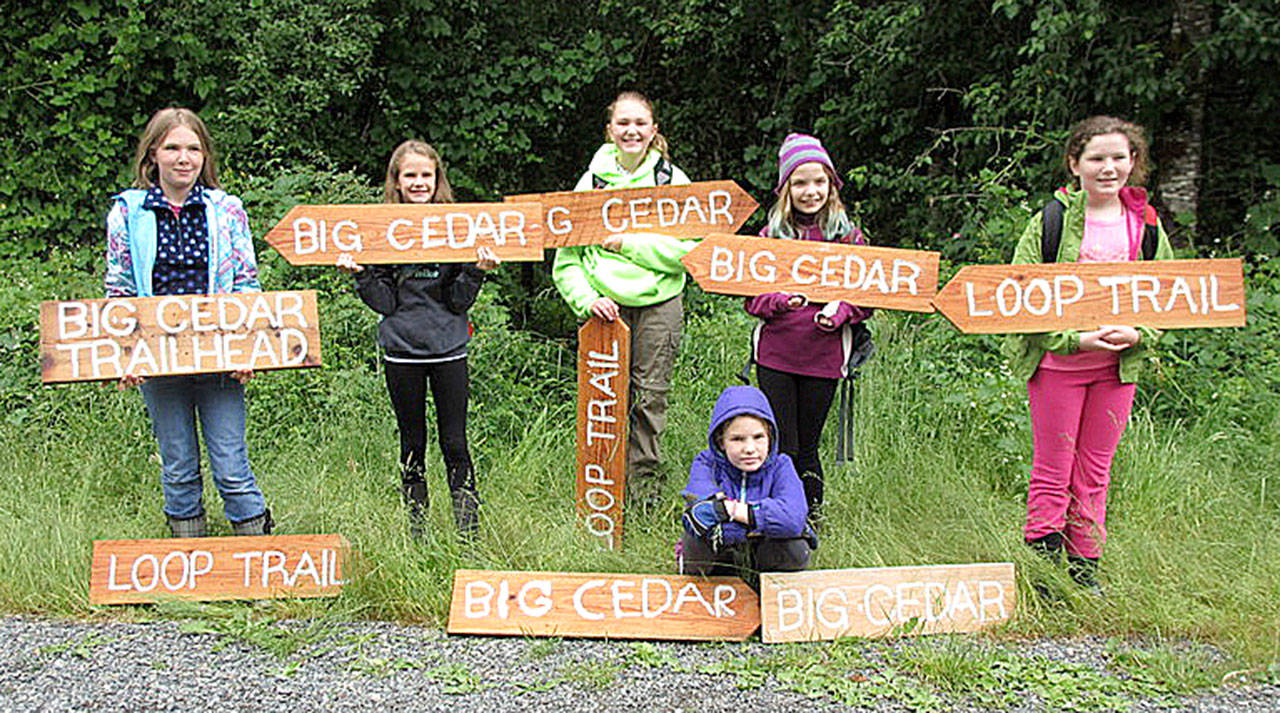 Girls participating in the Big Cedar Trail project include from left, standing - Sarah Hays, Elsie Ronald, Ember Thompson, Audrey Buchthal, Natalie Schubert, and kneeling - Addy Bastien. Courtesy Photo