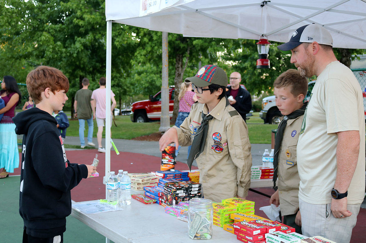 Boy Scout Troop 115 had their own concession stand selling popcorn, water and candy at community park. (Evan Pappas/Staff Photo)