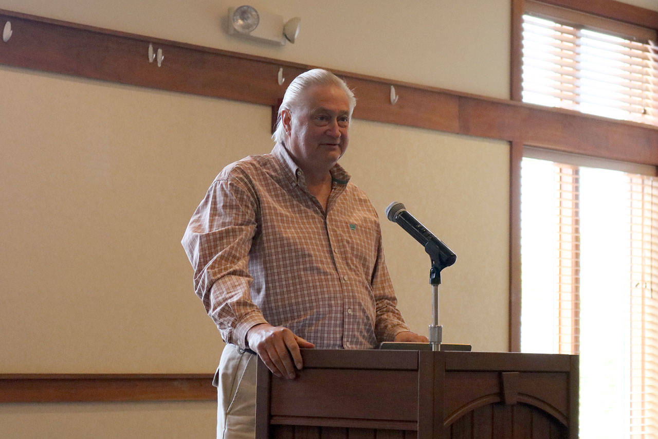 Tom Sroufe, representative for Snoqualmie Mill Ventures, takes questions from the audience about the proposed mill site development at the Snoqualmie Valley Chamber of Commerce luncheon on June 28.                                (Evan Pappas/Staff Photo)
