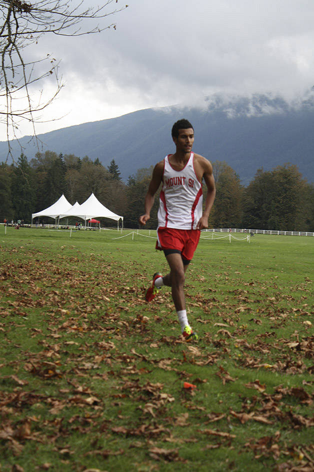 Mount Si runner Devin Sharps races at Mountain Meadows Farm in a 2013 home meet for the team.                                (File Photo)