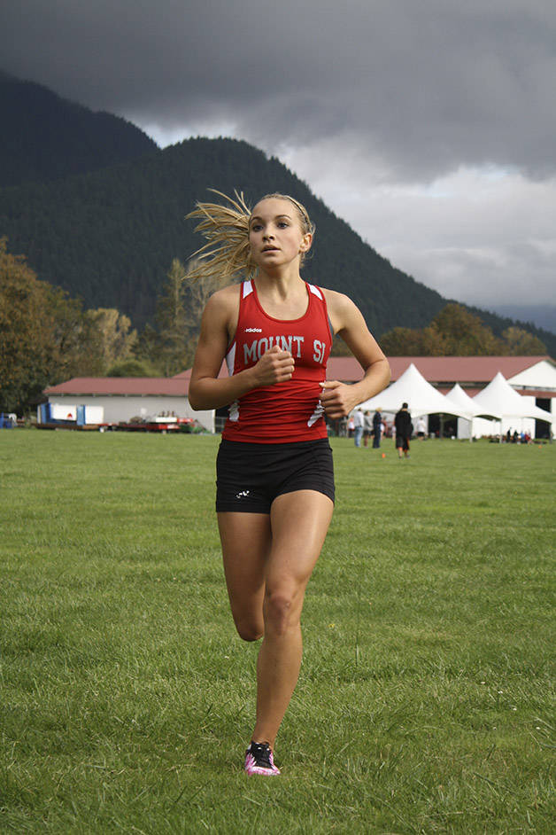 Mount Si runner Lyndsey Sydnor races at Mountain Meadows Farm in a 2013 home meet for the team.                                (File Photo)