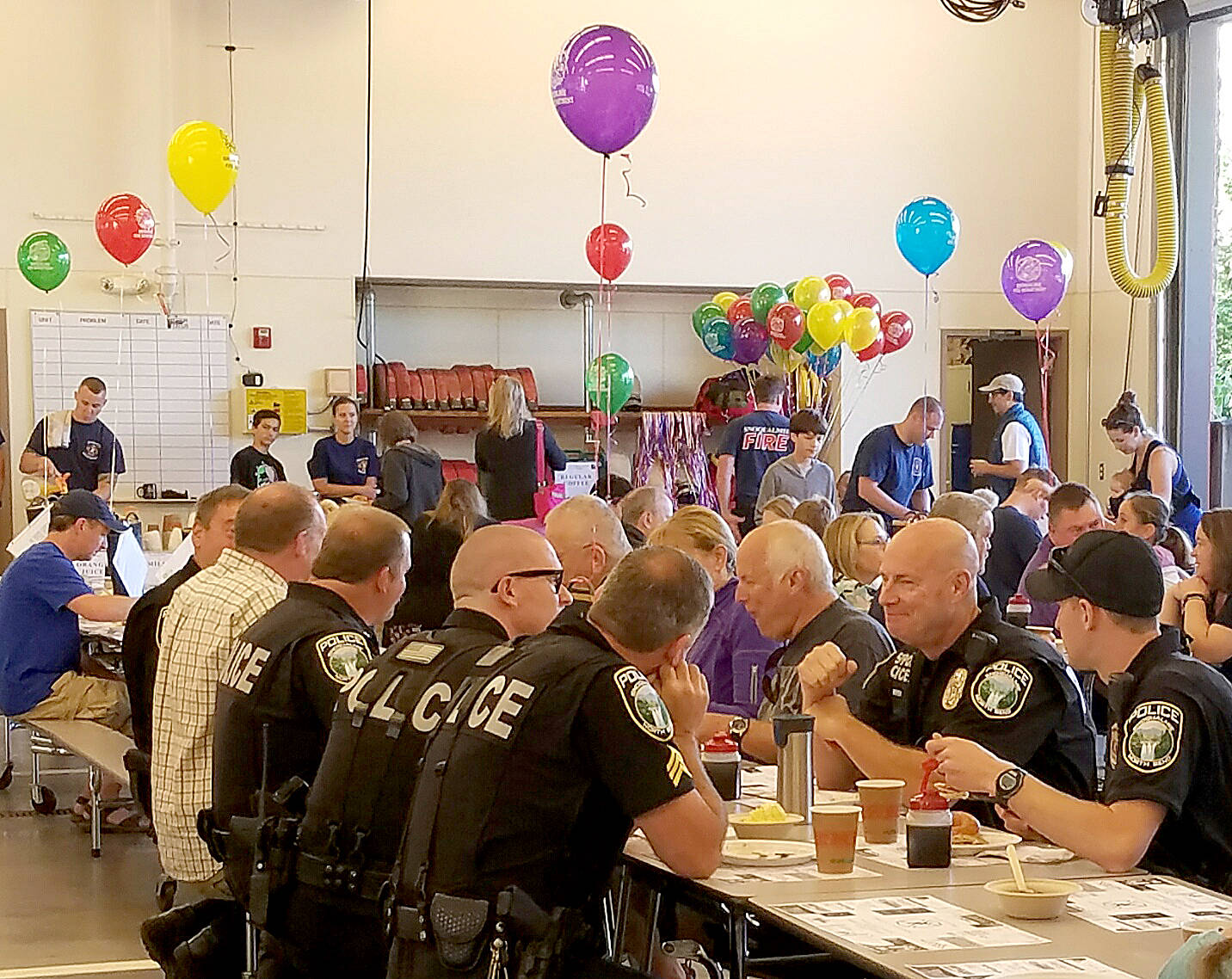 Guests enjoy a pancake breakfast at the Snoqualmie Fire Station during the 2016 event. (Courtesy Photo)