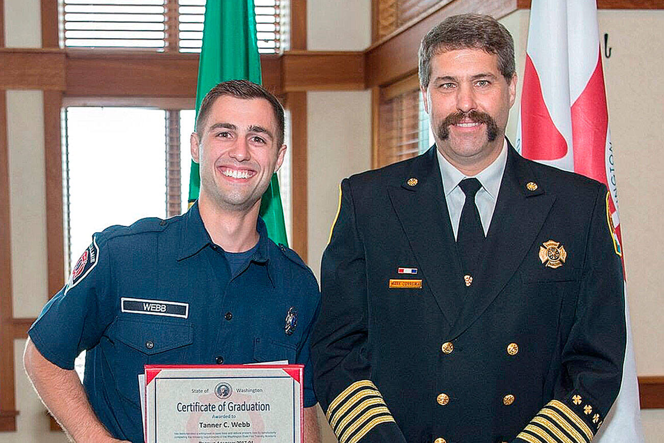 Tanner Webb, volunteer firefighter with Snoqualmie, graduates Fire Training Academy with honors