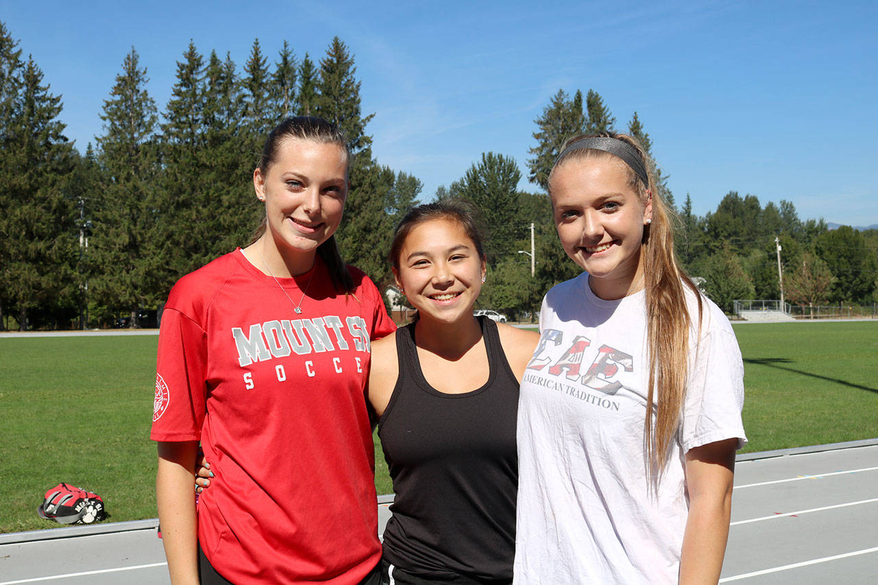 Mount Si’s girls soccer captains are eager to work with the team’s new coach to take the team farther than they’ve ever been. From left, Olivia Henning, Shelby Johnson and Mia Fowler. (Evan Pappas/Staff Photo)