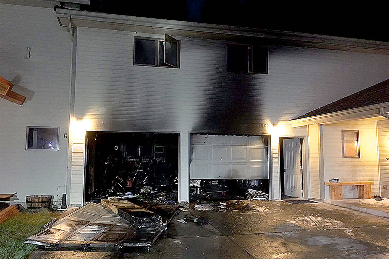 A North Bend home suffered fire damage caused by oily rags left in the garage on Sept. 12. (Courtesy Photo)