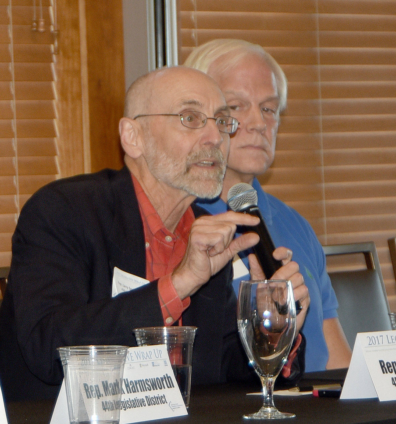 Rep. Larry Springer emphasizes the importance of finding a resolution to the impact of the Supreme Court’s Hirst decision at a Sept. 14 legislative wrap-up session at The Club at Snoqualmie Ridge. (Carol Ladwig/Staff Photo)