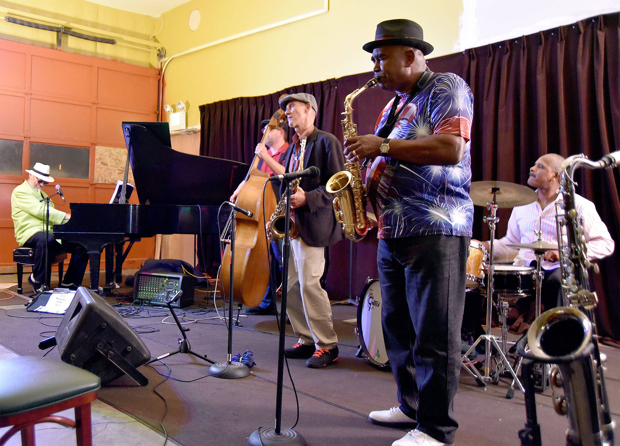 The Two Scoops Combo, featuring Hank Witherspoon, right, on saxophone, with Eric “Two Scoops” Moore on piano played for a full house at the 2016 Blues Walk in the fire hall, now home to JazzClubsNW. (Carol Ladwig/Staff Photo)